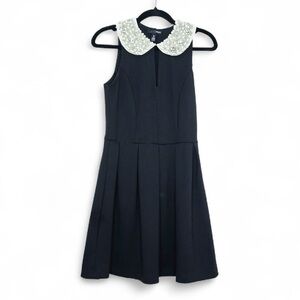 Elegant Black Sleeveless Women’s Dress with Pearl Collar